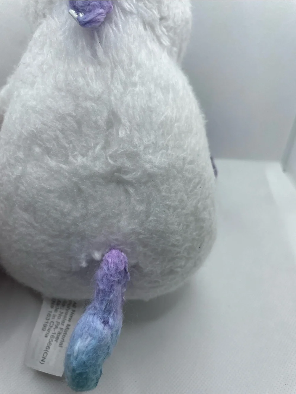 White Unicorn Plush with Iridescent Purple Hooves and Horn Sz Small